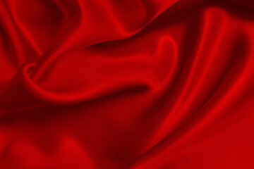 Dark red fabric texture background, detail of silk or linen pattern.