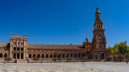 Fototapeta premium Sevilla, Spain - August 01, 2024: Plaza de Espana in Seville, Andalusia. The Plaza de Espana, built in 1928, is a plaza in the Parque de Maria Luisa in Seville, Spain.