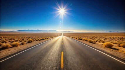 Fototapeta premium A sun-drenched asphalt highway extends towards a distant mountain range under a vibrant blue sky, promising adventure and the open road ahead