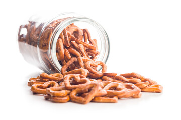 Heart shaped pretzel in jar isolated on white background.