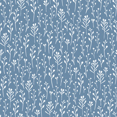 White seamless pattern of silhouettes of small wildflowers on a blue background