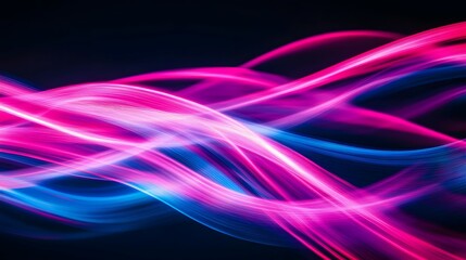Abstract light painting background with neon pink and blue lines on a black canvas, creating dynamic patterns