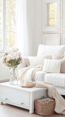 Soft pink peonies in a clear vase brighten a stylish living room with a cozy sofa and large windows allowing natural light