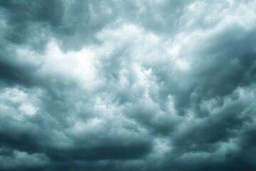 Obraz premium A Dramatic View of a Dense and Dark Storm Cloud Formation in the Sky
