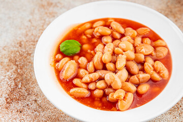 White bean tomato sauce delicious gourmet food background on the table rustic food top view copy space keto and paleo diet vegetarian and vegan food