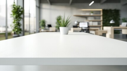 Sleek white rectangular wooden table with natural lighting and blurred contemporary office background featuring desk, computer, and plants
