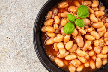 White bean tomato sauce delicious gourmet food background on the table rustic food top view copy space keto and paleo diet vegetarian and vegan food