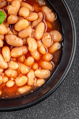 White bean tomato sauce delicious gourmet food background on the table rustic food top view copy space keto and paleo diet vegetarian and vegan food