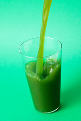 グラスに注いだ青汁　Aojiru (green juice) poured into a glass