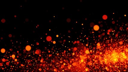 Fototapeta premium Vibrant Fire Embers and Sparks Against a Black Background