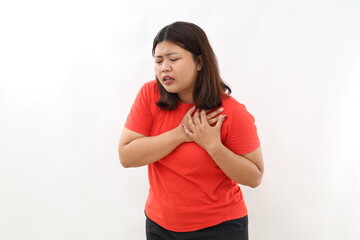 Sick asian woman with heart attack, pain, health problem holding touching her chest with hands...