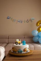 Beautiful birthday cake with yellow tractor