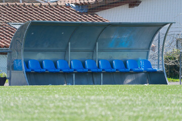 Empty benches await the next thrilling soccer match at the stadium