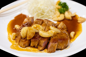 Top view of Kobe Tonteki with Crispy rice vermicelli, focus selective