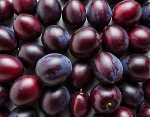 Fototapeta premium Close-Up of Fresh Ripe Plums with Vibrant Colors