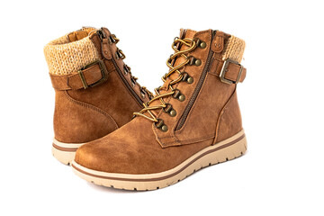 Brown women's leather boots with high lacing. Demi seasonal boots with zipper locks on white background.