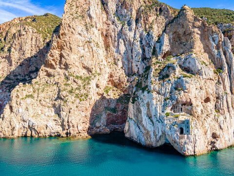 Views of coast, cliffs and Porto Flavia mining, Sardinia island, Italy