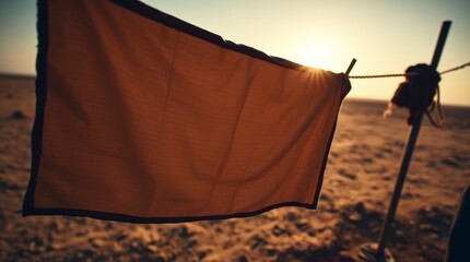 Art photograph a piece of cloth is dried on a rope on dry ground