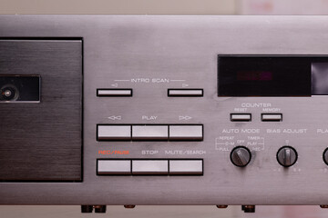 Obraz premium Close-Up of Vintage Audio Cassette Player Control Panel with Metal Finish