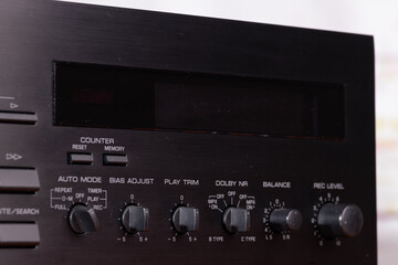 Vintage Audio Tape Deck with Illuminated Display and Control Knobs