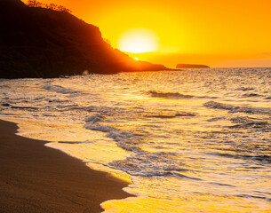 Sunset on The Black Sand of Oneuli Beach With Molokini In The Distance, Makena State Park, Maui,...