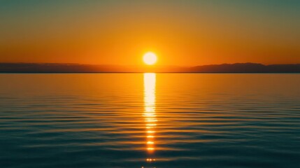Naklejka premium Calm Lake at Sunset with Golden Sunlight Reflection and Mountain View