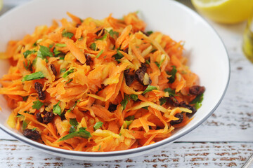 A bowl with traditional Polish carrot salad  © nastyakamysheva