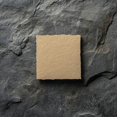 Blank Beige Handmade Paper on Dark Grey Stone Background