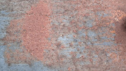 Rust on the iron door for the background. old peeling paint on rusty grates. Rusty metal texture.