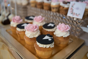 Elegant Wedding Candy Bar with Colorful Sweets, Cakes, and Fruits