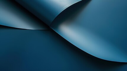 A smooth metallic surface with a glossy gradient finish is placed on a Pacific deep blue paper background, showing a modern and sleek aesthetic. The deep blue hue of the paper contrasts beautifully 