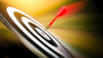 Obraz premium A dart hitting the bullseye on a professional dartboard, with motion blur