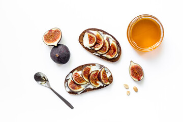 Fig sandwiches with cheese and honey for breakfast. Top view