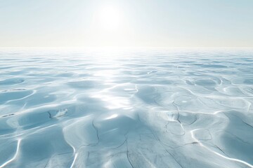 underwater view of the ocean floor, with sunlight filtering through clear water to create ripples on its surface