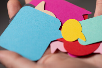 Abstract image of colorful speech bubbles, representing communication and ideas.