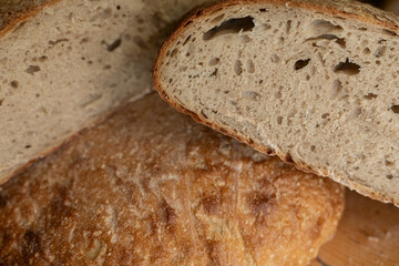 Close-up of crusty sourdough bread, perfect for baking blogs & websites.