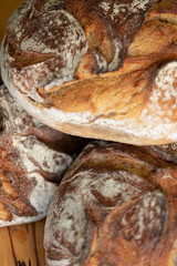 Close-up of rustic sourdough bread, perfect for baking blogs & recipes.