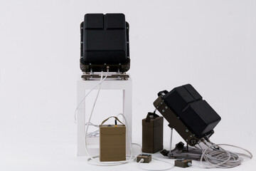 Advanced Electronic Warfare System Featuring Portable Signal Jammers and Power Units