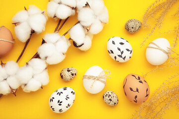 Easter background - white easter egg with flowers inside on yellow background. Happy easter, spring, summer floral concept