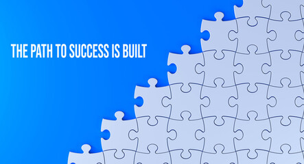 The path to success is built text message on jigsaw puzzle. Blue background and word banner concept