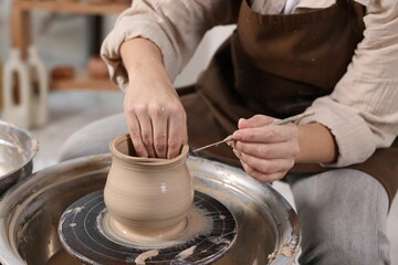 Hobby and craft. Woman making pottery indoors, closeup