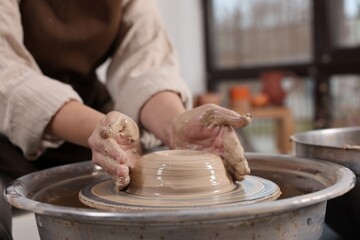 Hobby and craft. Woman making pottery indoors, closeup