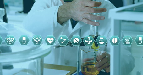 Image of medical icons over caucasian male scientists working at laboratory