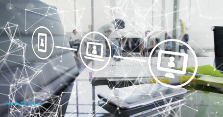 Image of network of connections with icons over diverse colleagues working in office