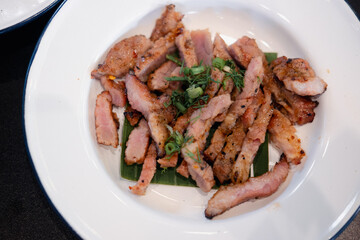 Thai slice of juicy grilled beef. Thai food style for eating with Somtum. Thai grilled beef brisket