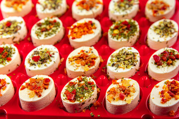 cheese appetizer soft cheese with herbs and tomatoes pieces fresh tasty food dish delicious gourmet food background on the table rustic food top view copy space