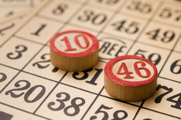 vintage bingo card and chips with numbers