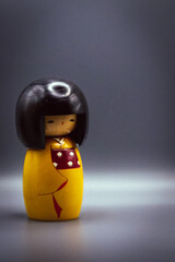 Kokeshi Dolls, isolated on a grey background