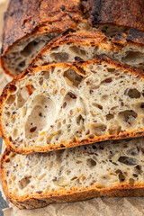 Grain bread sunflower, chia, flax seed, cut oats fresh tasty food dish delicious gourmet food background on the table rustic food top view copy space vegetarian and vegan food