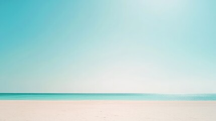 Obraz premium An empty beach with clear water and vibrant turquoise sky